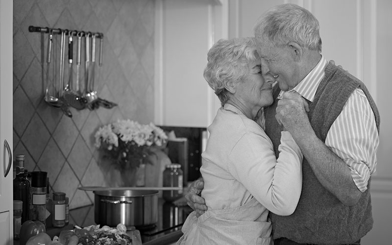 You make every moment special...Cropped shot of an elderly couple standing together in the kitchen.
